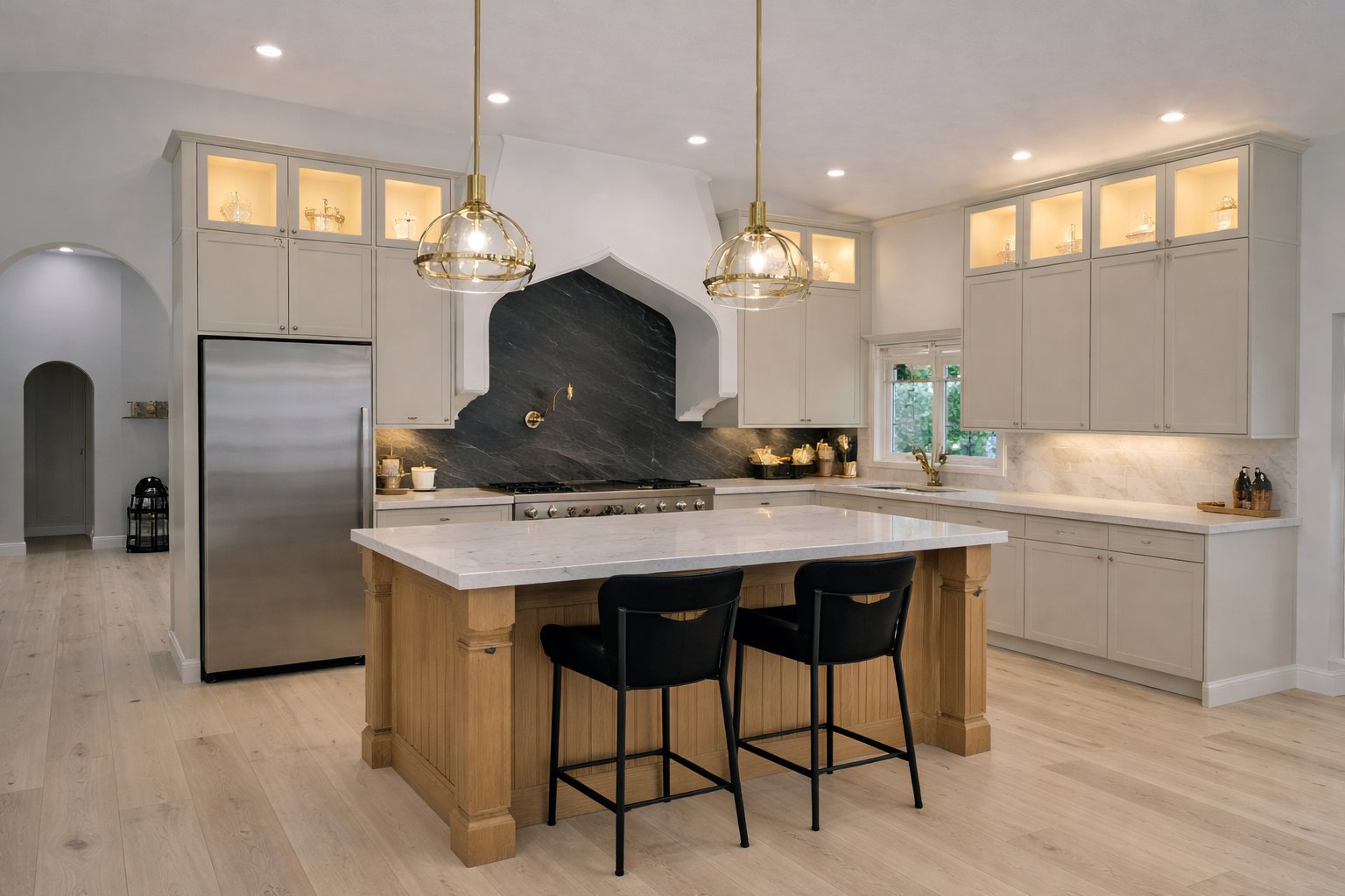 Luxury kitchen with arched details and black marble